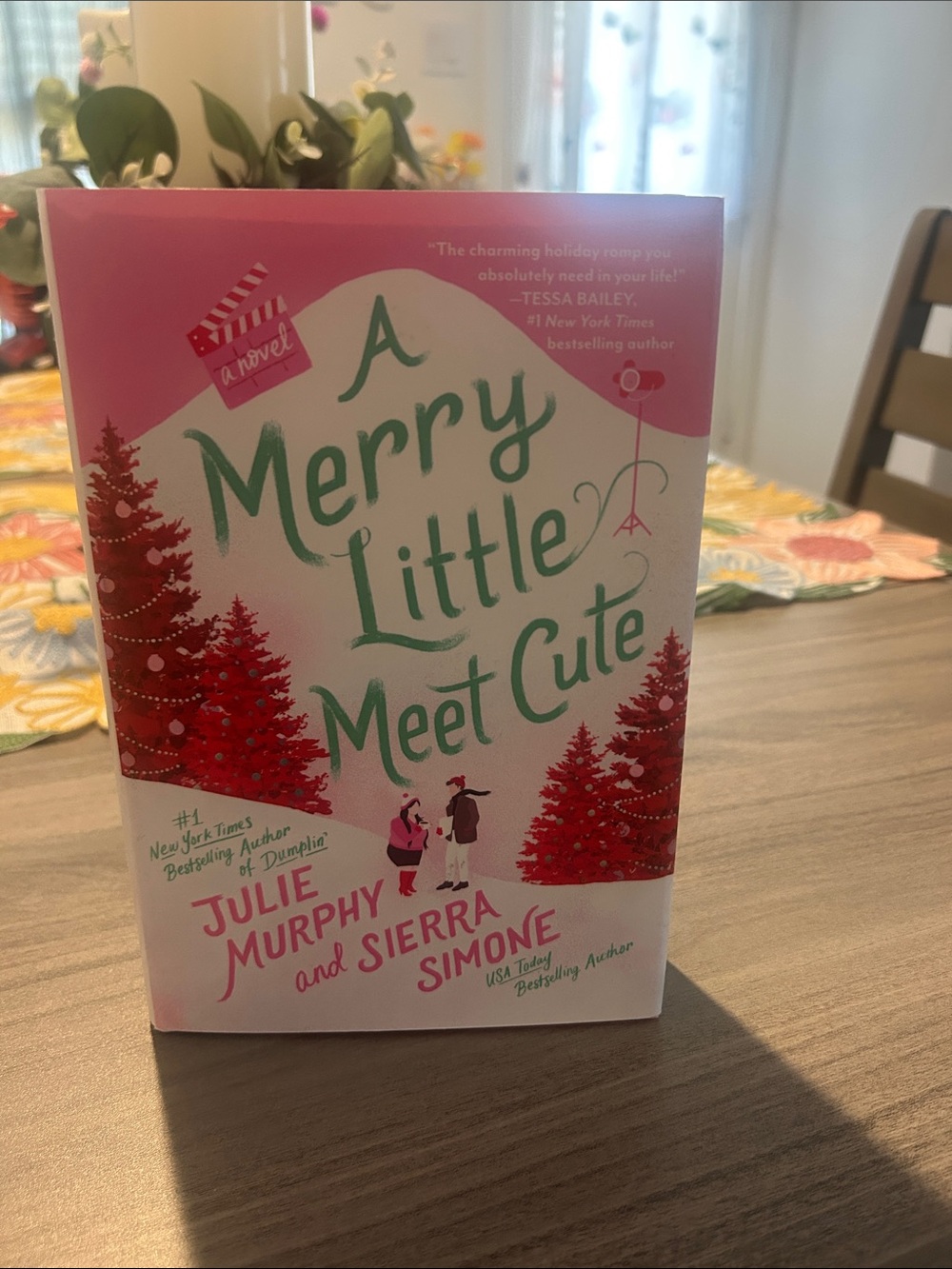 Pink Holiday Novel 'A Merry Little Meet Cute' by Julie Murphy & Sierra Simone
